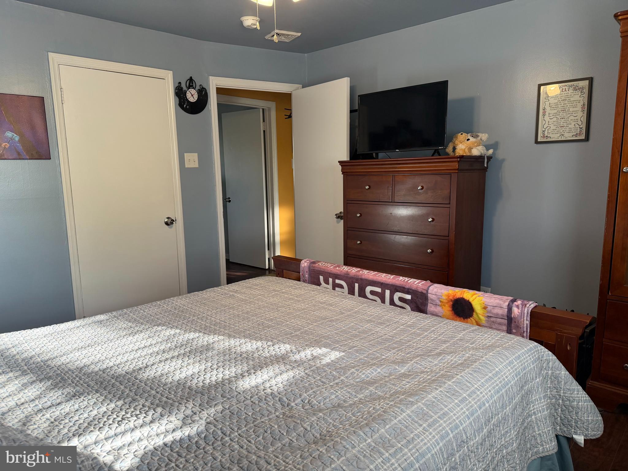 1 Nassau Road Somers Point, NJ 08244 - Photo 21 of 43 a bedroom with a bed and a flat screen tv