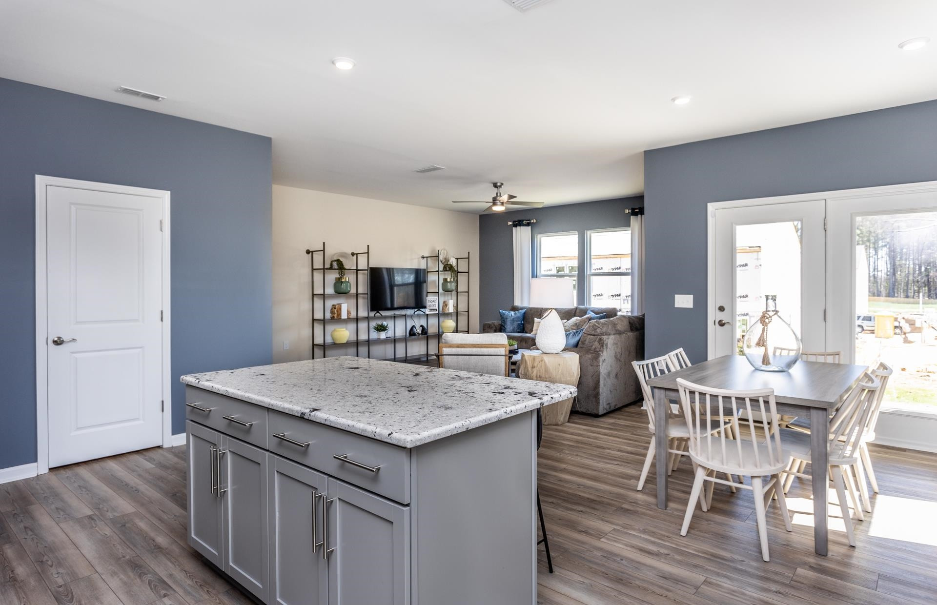 3508 New Town Road Raleigh, NC 27604 - Photo 11 of 27 a view of kitchen island with granite countertop wooden floor and center island
