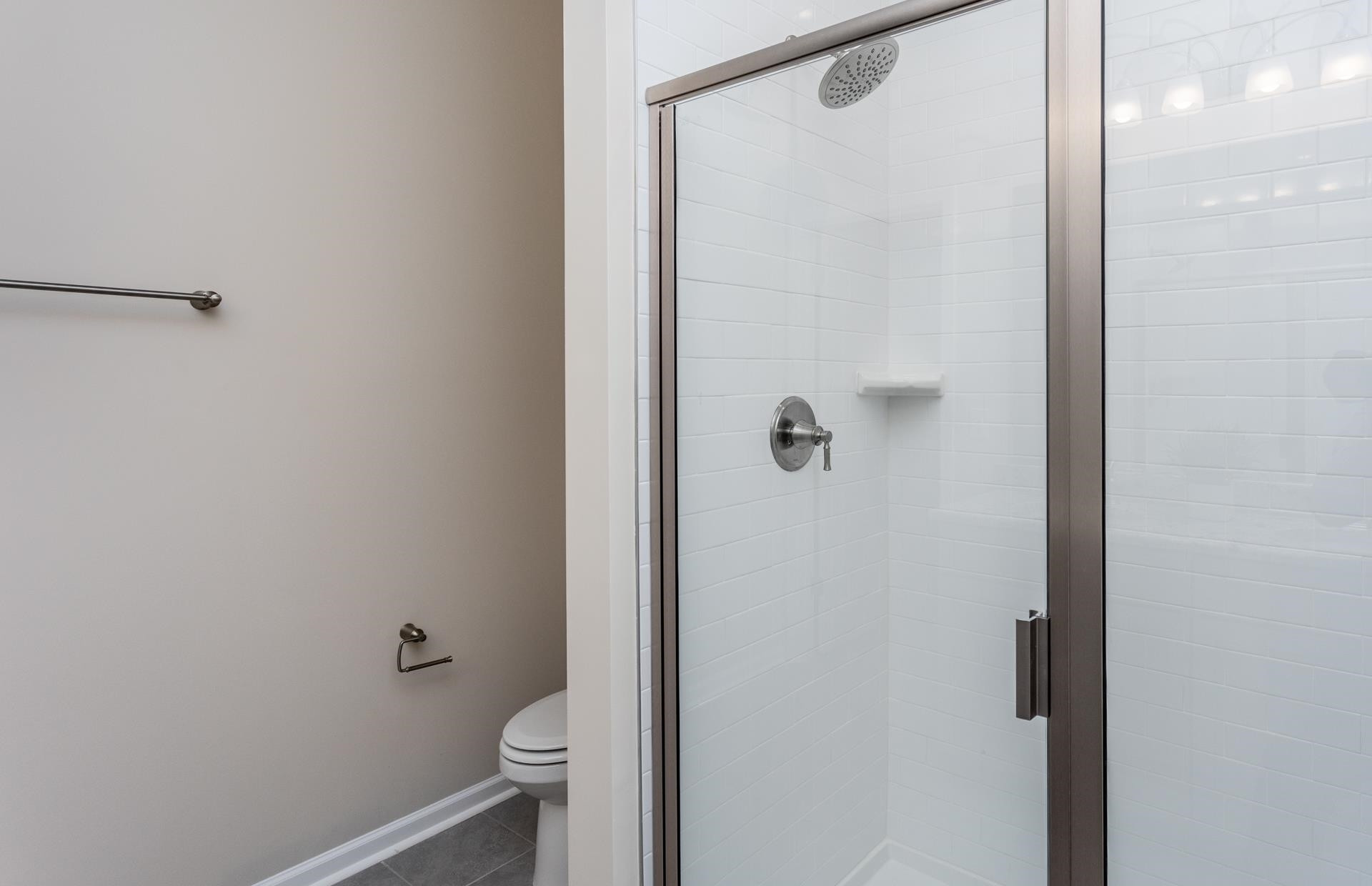 3508 New Town Road Raleigh, NC 27604 - Photo 20 of 27 a bathroom with a granite countertop shower and a toilet