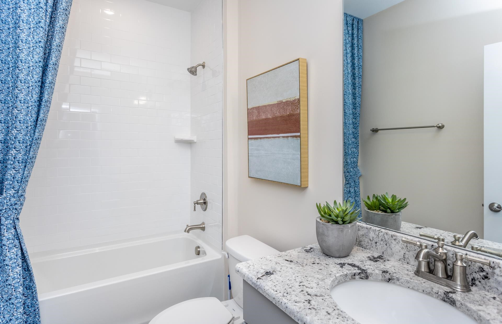 3508 New Town Road Raleigh, NC 27604 - Photo 21 of 27 a bathroom with a granite countertop sink a toilet and tub