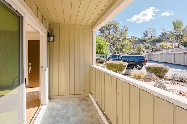 a view of a balcony with an outdoor space