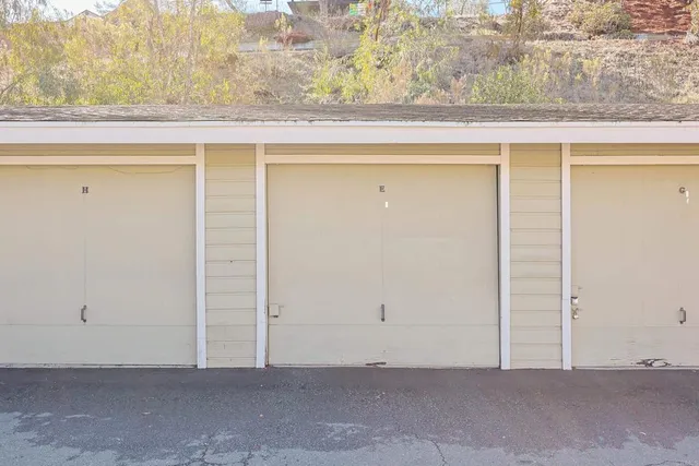 a view of balcony with furniture
