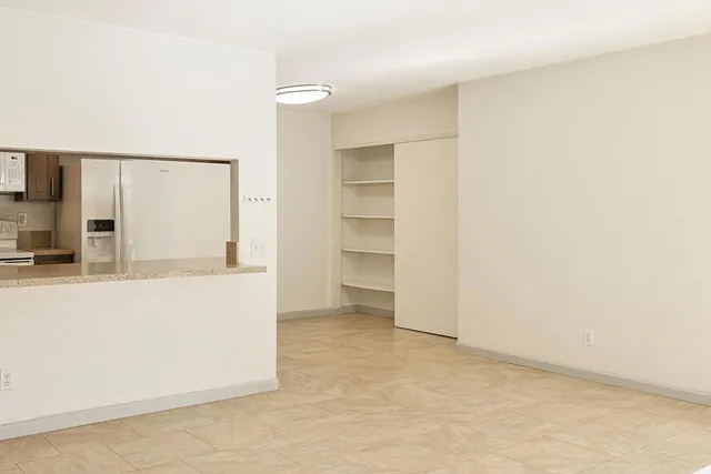 a view of a livingroom with a ceiling fan