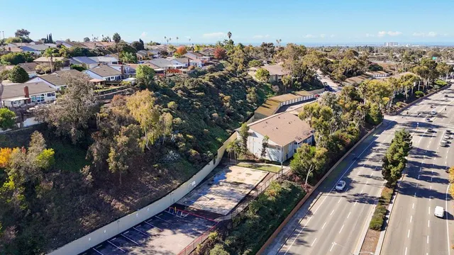 an aerial view of a city with lots of residential buildings