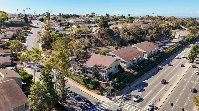 an aerial view of house with yard