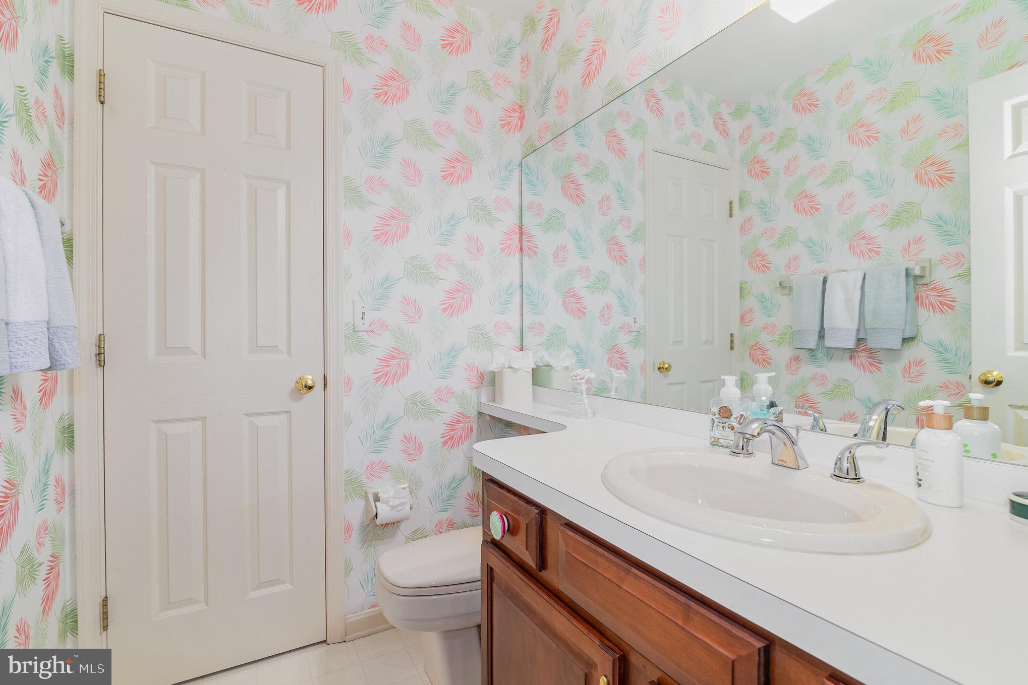 17 Leearden Road Hershey, PA 17033 - Photo 19 of 36 a bathroom with a sink a toilet and shower curtain