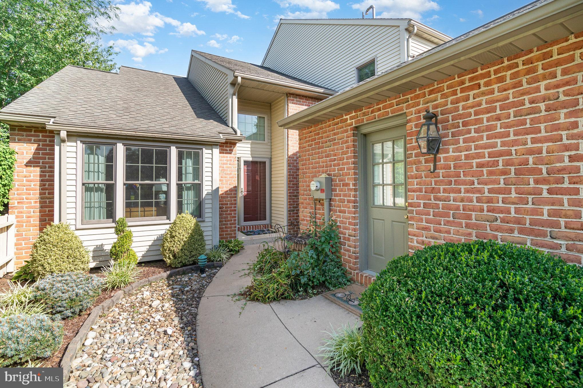 17 Leearden Road Hershey, PA 17033 - Photo 2 of 36 a front view of a house with garden
