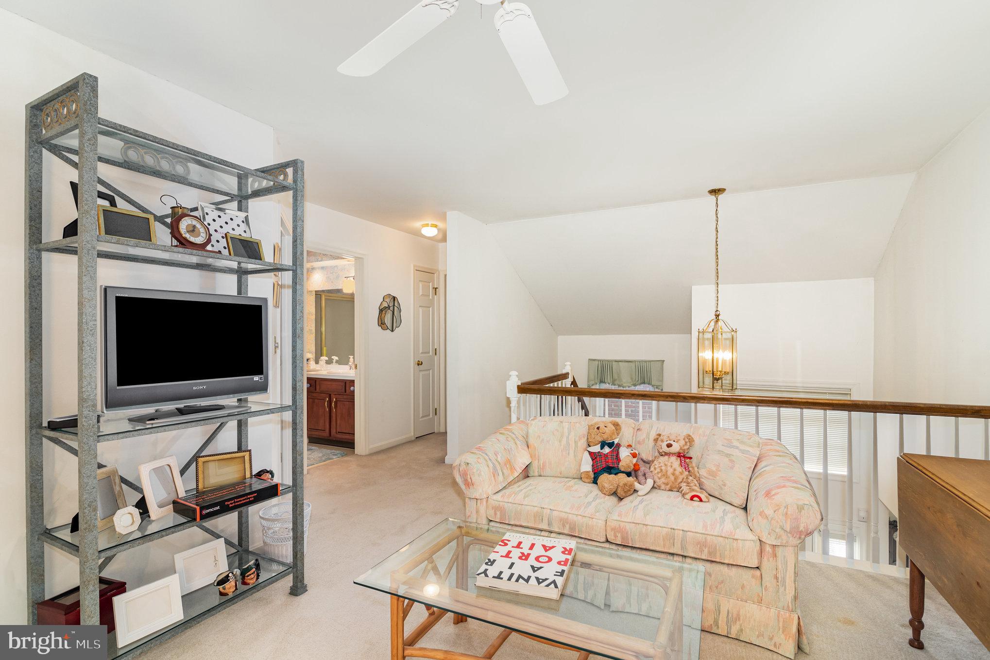 17 Leearden Road Hershey, PA 17033 - Photo 21 of 36 a living room with furniture and a flat screen tv