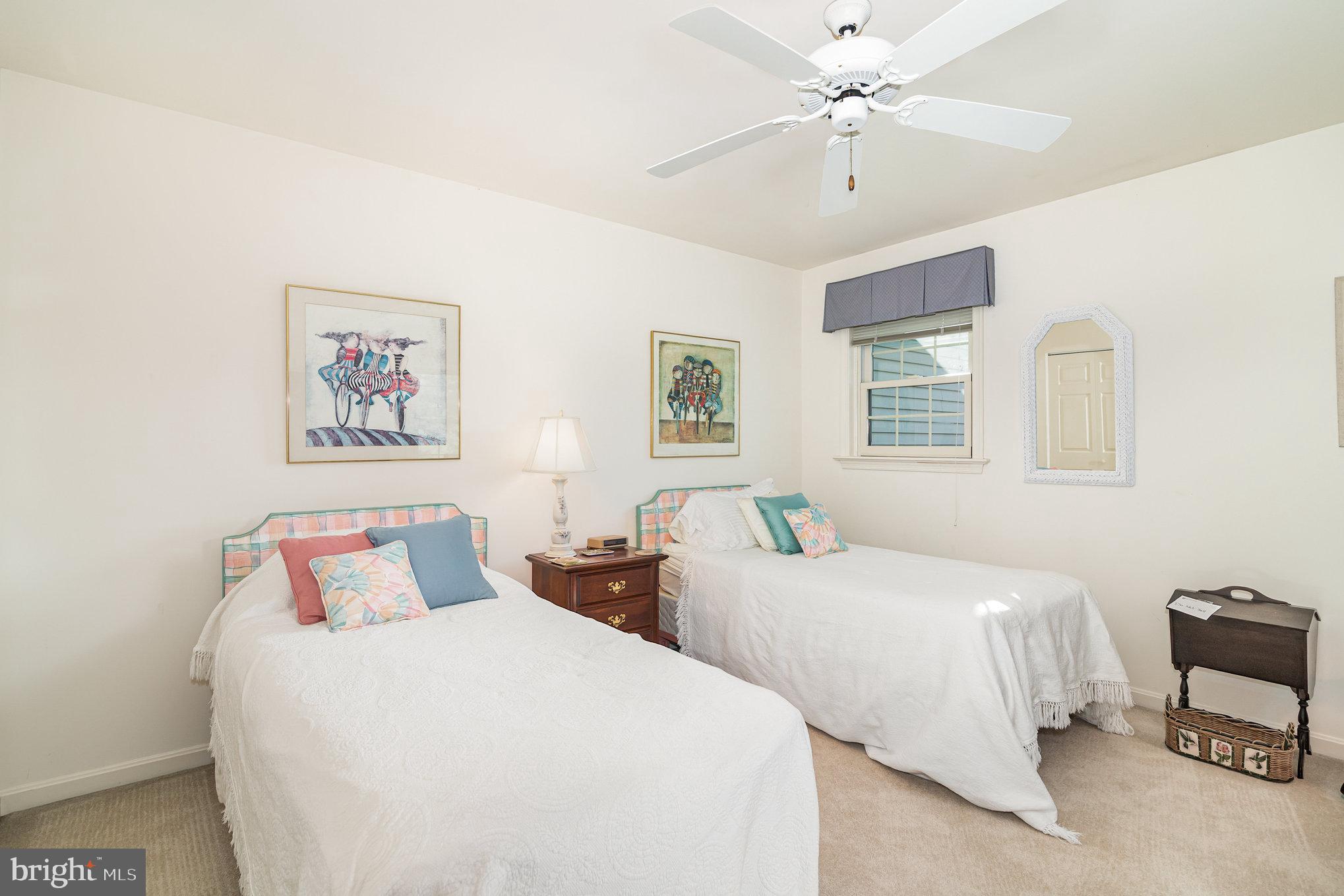 17 Leearden Road Hershey, PA 17033 - Photo 25 of 36 a bedroom with two beds and a chandelier