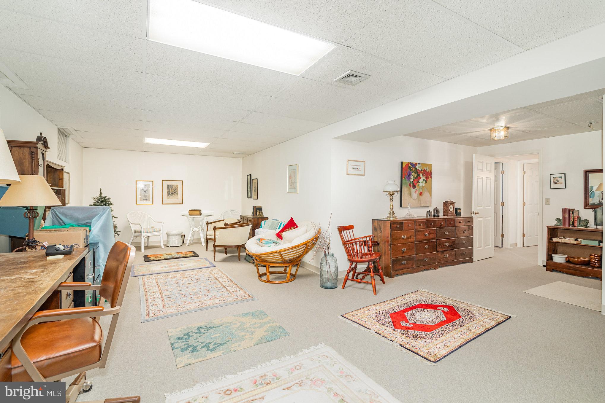17 Leearden Road Hershey, PA 17033 - Photo 28 of 36 a living room with lots of furniture and clutter