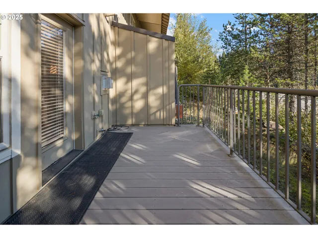 a view of a pathway with a balcony