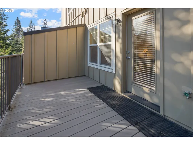 a view of wooden floor in a backyard