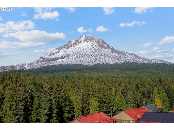 a view of lake and mountain