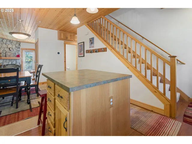 a view of entryway with dining area and chandelier