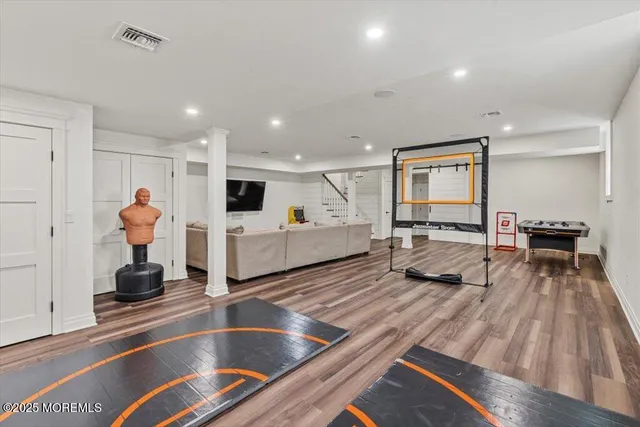 a kitchen with sink refrigerator and large window