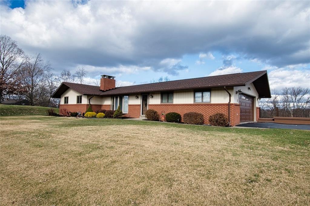 1050 Lagonda Road Washington, PA 15301 - Photo 2 of 25 a front view of house with yard and car parked