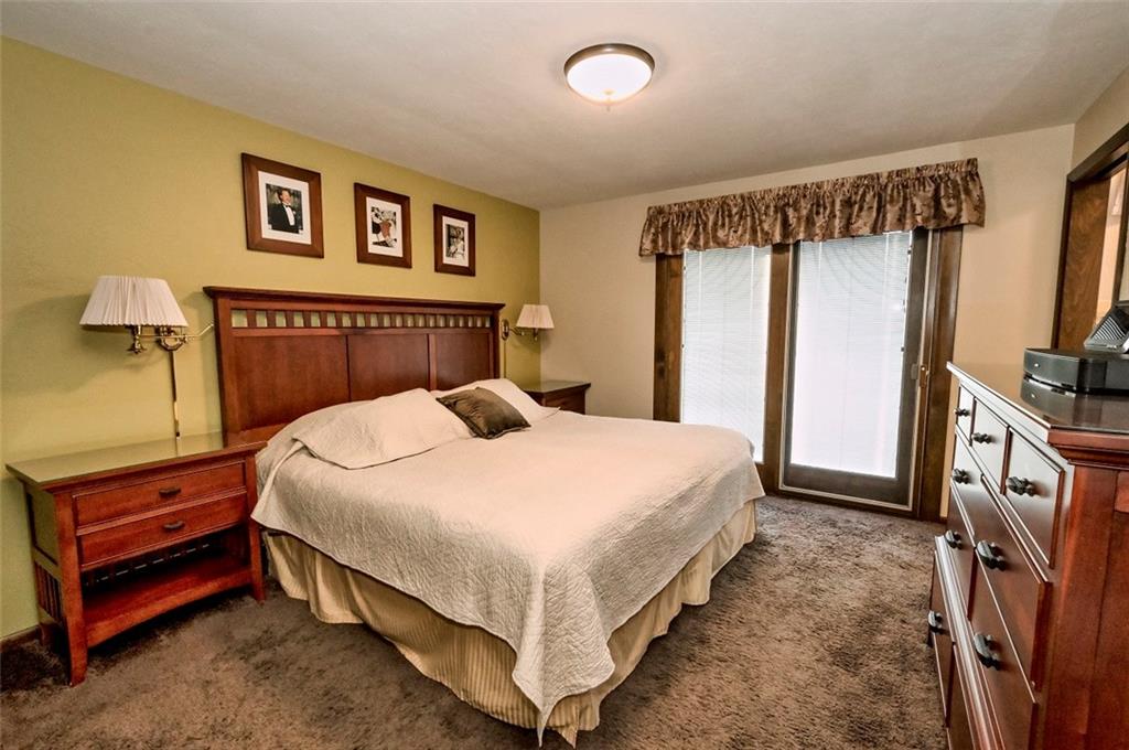 1050 Lagonda Road Washington, PA 15301 - Photo 12 of 25 a bedroom with a bed and a flat screen tv