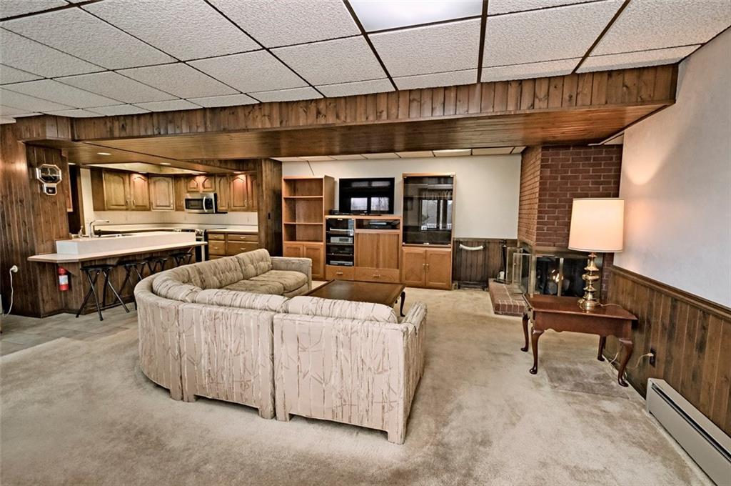 1050 Lagonda Road Washington, PA 15301 - Photo 18 of 25 a living room with furniture and a chandelier