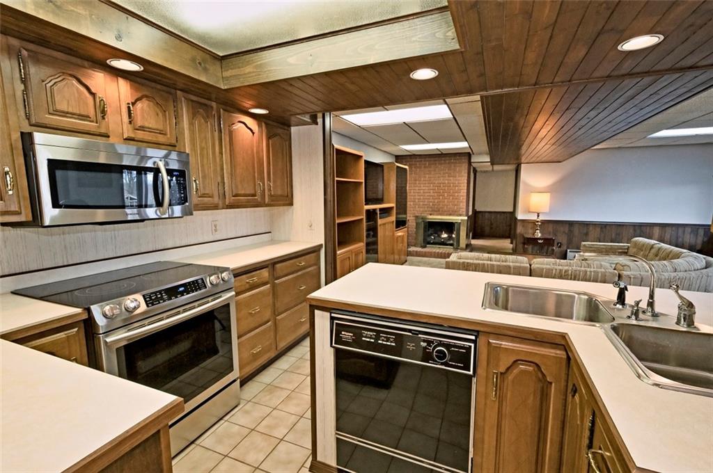 1050 Lagonda Road Washington, PA 15301 - Photo 20 of 25 a kitchen with a stove and a sink