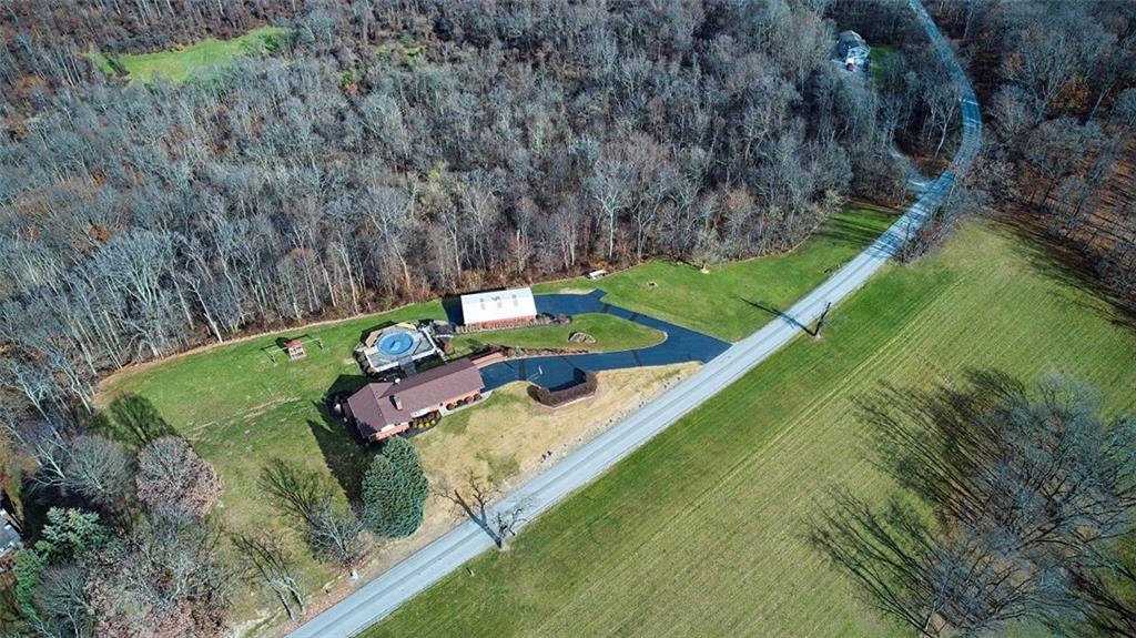 1050 Lagonda Road Washington, PA 15301 - Photo 3 of 25 a view of a lake with a yard