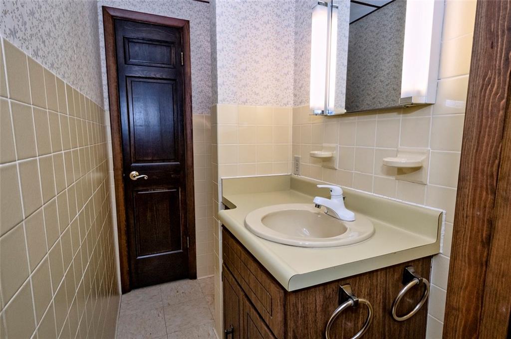 1050 Lagonda Road Washington, PA 15301 - Photo 22 of 25 a bathroom with a sink a vanity and a shower