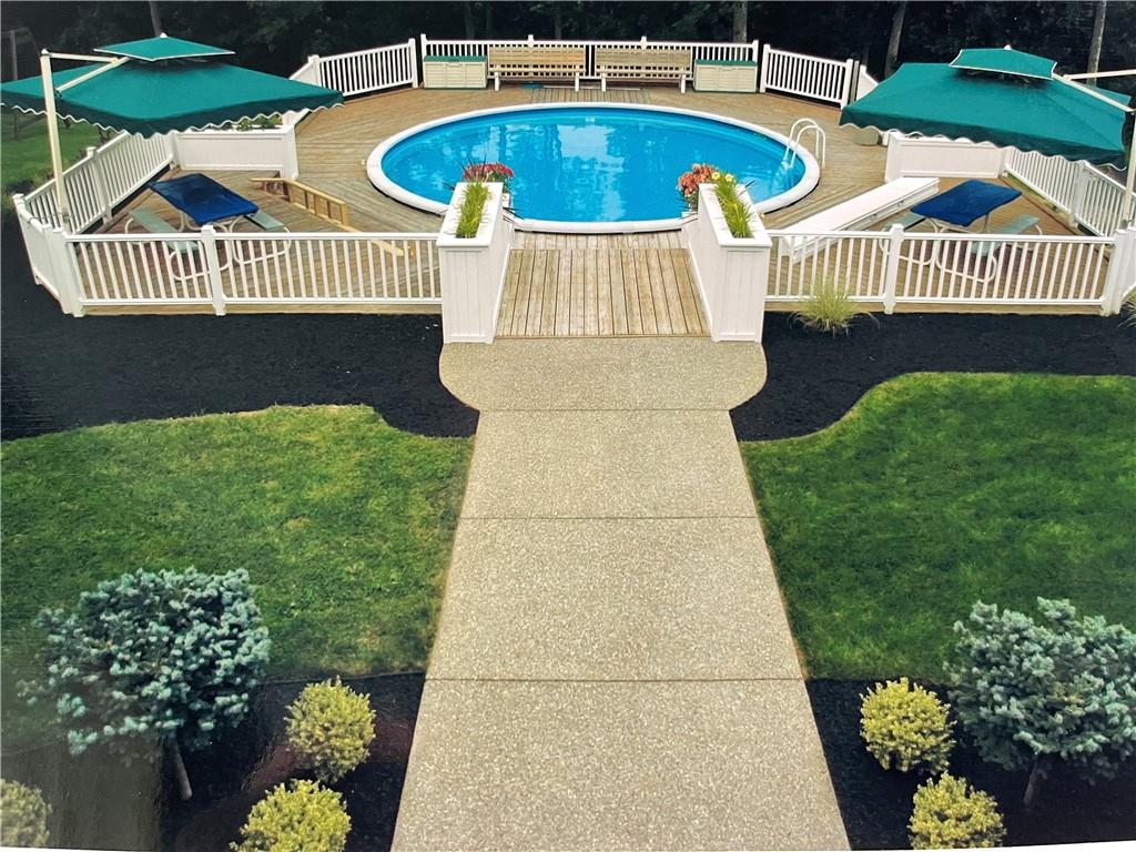 1050 Lagonda Road Washington, PA 15301 - Photo 25 of 25 a view of a swimming pool with deck and a garden