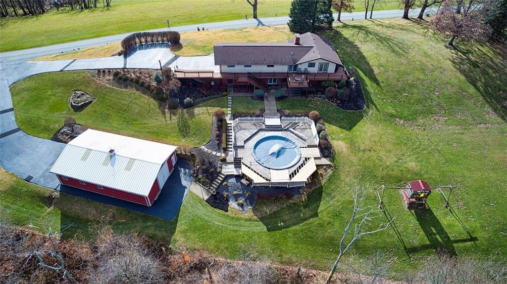 1050 Lagonda Road Washington, PA 15301 - Photo 4 of 25 an aerial view of a house with swimming pool and outdoor seating