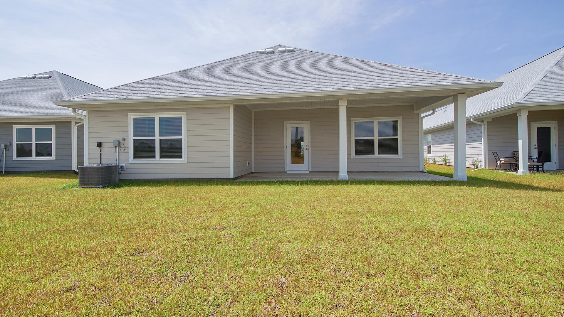 313 Holley Grv Lane Santa Rosa Beach, FL 32459 - Photo 34 of 34 front view of a house with a swimming pool
