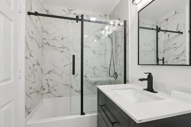 a bathroom with a sink and a bathtub