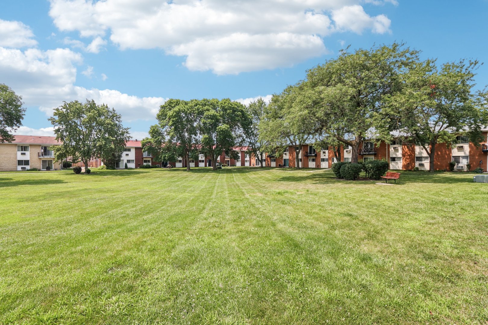 8916 Kenneth Drive, Unit 1E Des Plaines, IL 60016 - Photo 23 of 27 a view of a park with large trees