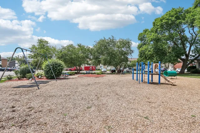 a view of road with card parked