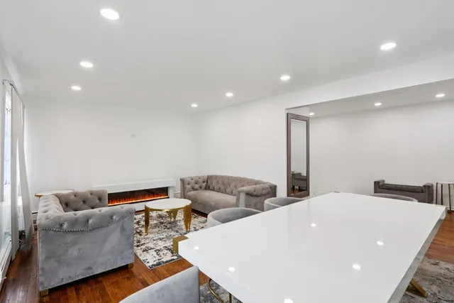 a living room with furniture and a couch