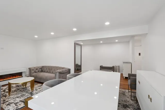 a living room with furniture and a couch