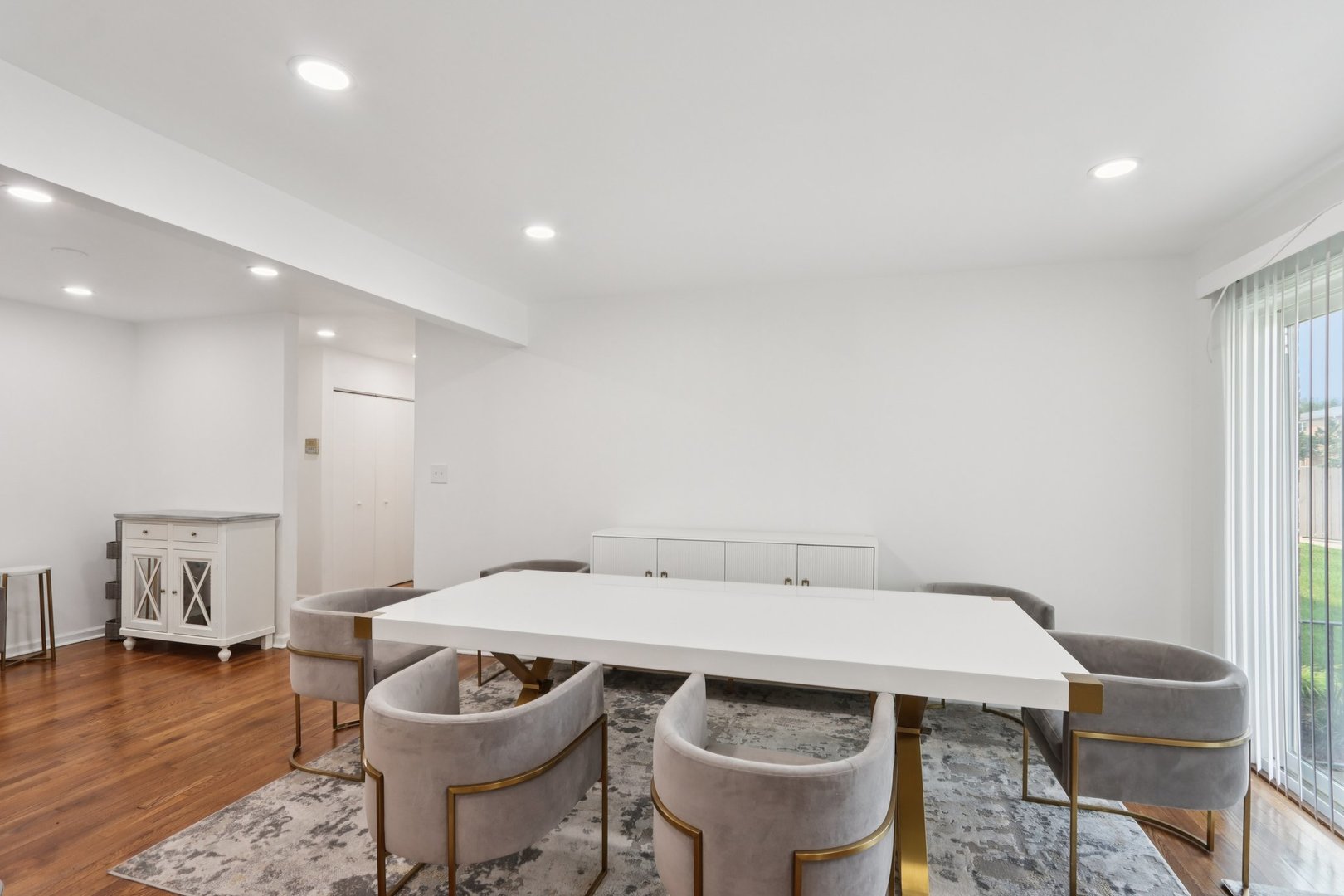 8916 Kenneth Drive, Unit 1E Des Plaines, IL 60016 - Photo 9 of 27 a view of a dining room with furniture and wooden floor