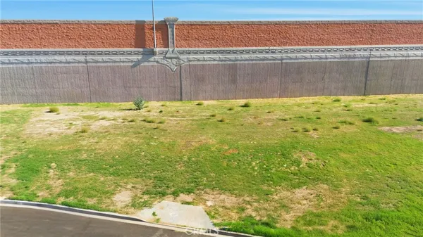 a view of a lake with a yard