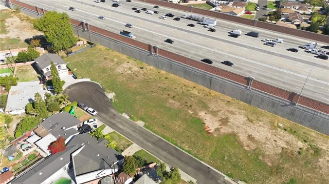 a view of a swimming pool with a table and chairs