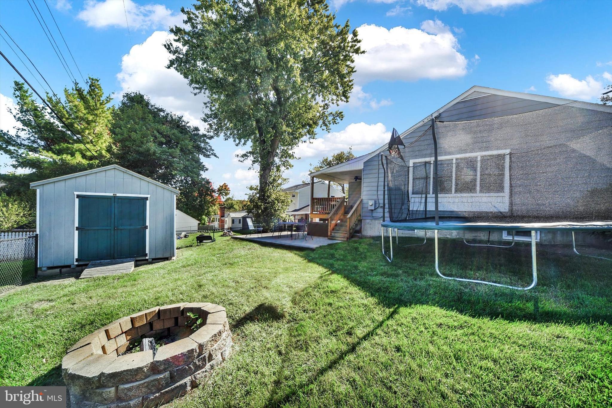 2027 Longview Avenue Rosedale, MD 21237 - Photo 26 of 26 fire pit and shed in back yard