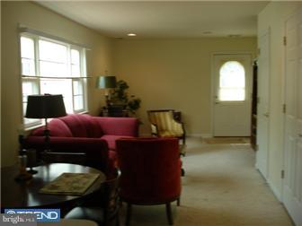 1435 Valley Forge Road Wayne, PA 19087 - Photo 8 of 11 a living room with furniture and a floor to ceiling window