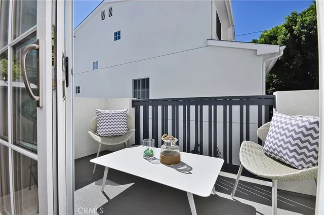a view of a table and chairs in patio