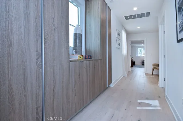 a view of a hallway with closet