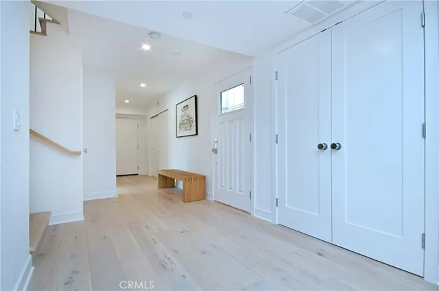 a view of a livingroom with wooden floor
