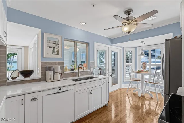 a very nice looking living room with a large window