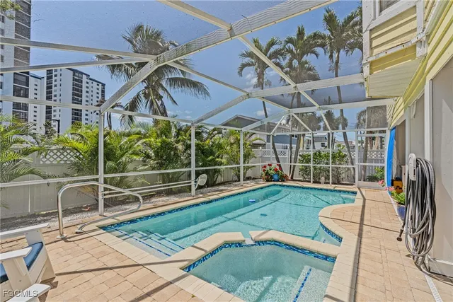 a view of a chairs and table in patio