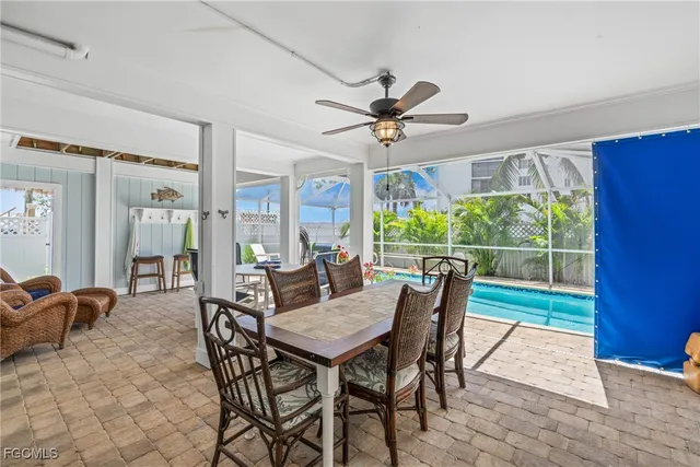 a kitchen with sink and cabinets