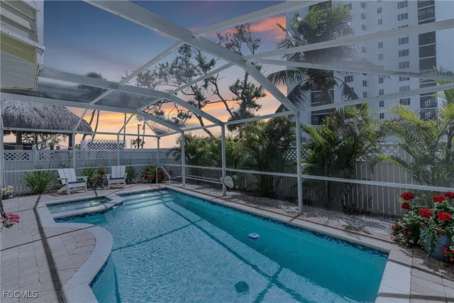 a view of a house with basketball court