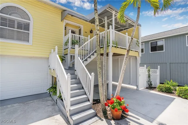 a view of entryway with flower pots
