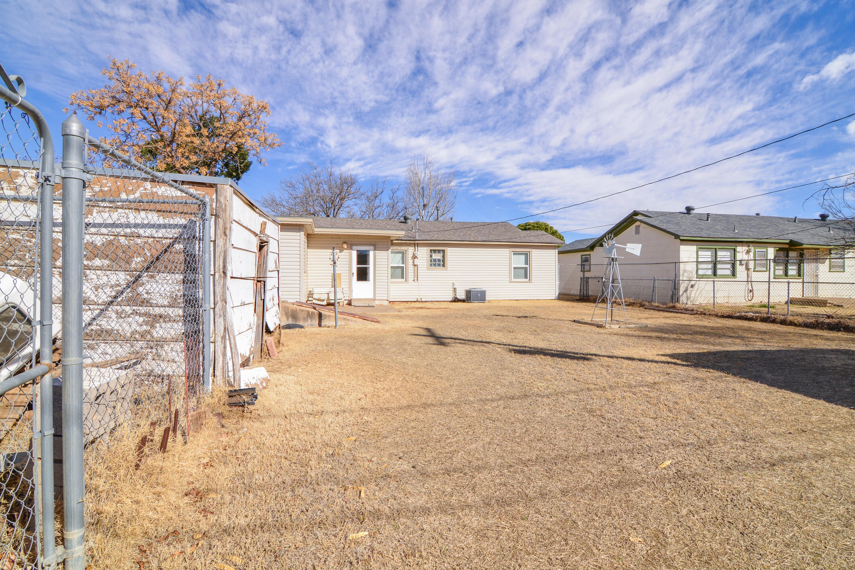4907 41st Street Lubbock, TX 79414 - Photo 32 of 39 a view of backyard of a house