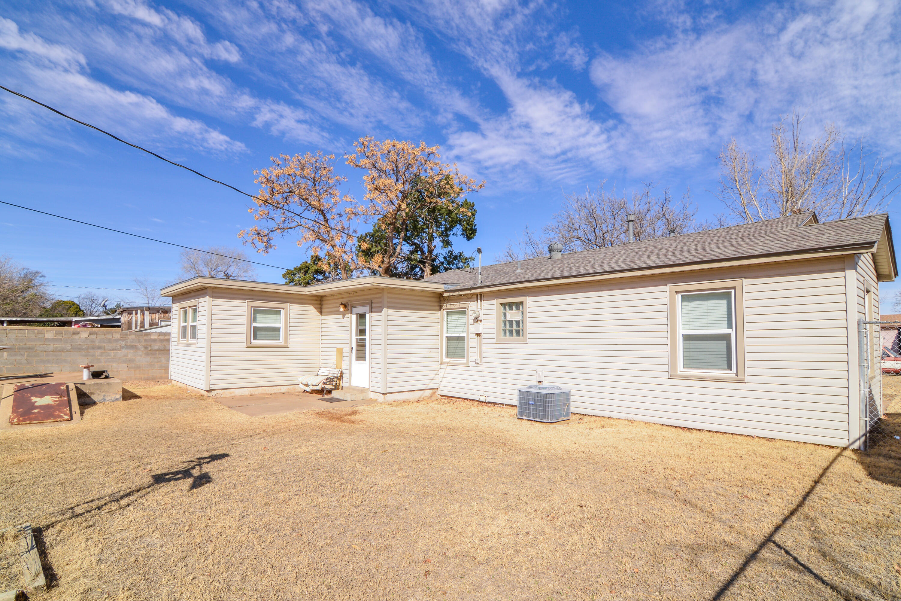 4907 41st Street Lubbock, TX 79414 - Photo 38 of 39 a view of a house with a backyard