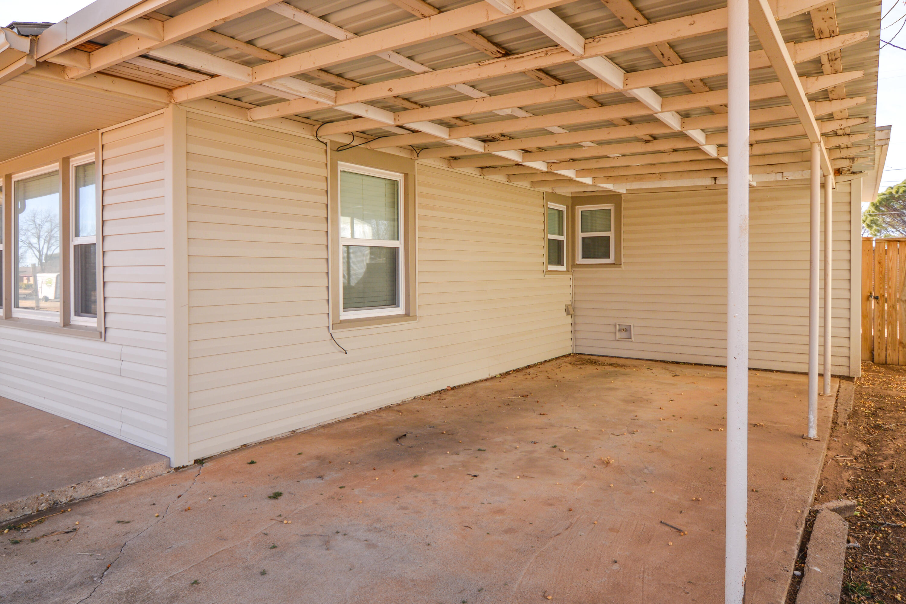 4907 41st Street Lubbock, TX 79414 - Photo 4 of 39 a view of a room with a wooden door