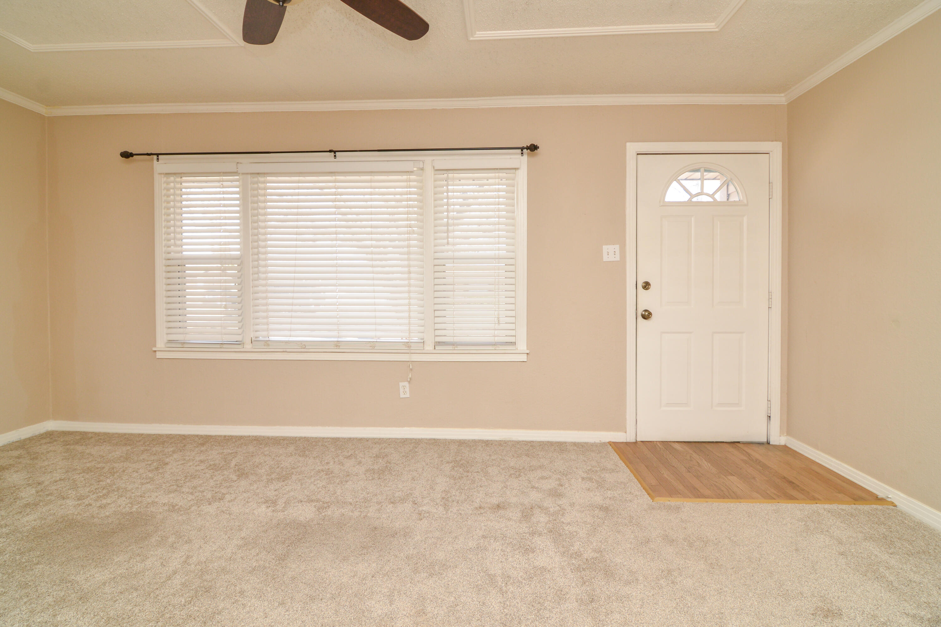 4907 41st Street Lubbock, TX 79414 - Photo 8 of 39 a view of empty room with window